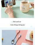Cat-themed ceramic mug with lid and spoon cartoon style perfect for office or home use coffee cup mugs mug glass mug cup  mugs