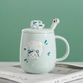 Cat-themed ceramic mug with lid and spoon cartoon style perfect for office or home use coffee cup mugs mug glass mug cup  mugs