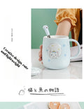 Cat-themed ceramic mug with lid and spoon cartoon style perfect for office or home use coffee cup mugs mug glass mug cup  mugs