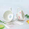 1pcs Irregular hand drawn underglaze color relief blue daisy pink bow ceramic mug water cup