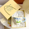 Cute ceramic cup as a holiday gift for girls - water cup with flowers, travel companion cup, coffee cup