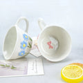 1pcs Irregular hand drawn underglaze color relief blue daisy pink bow ceramic mug water cup